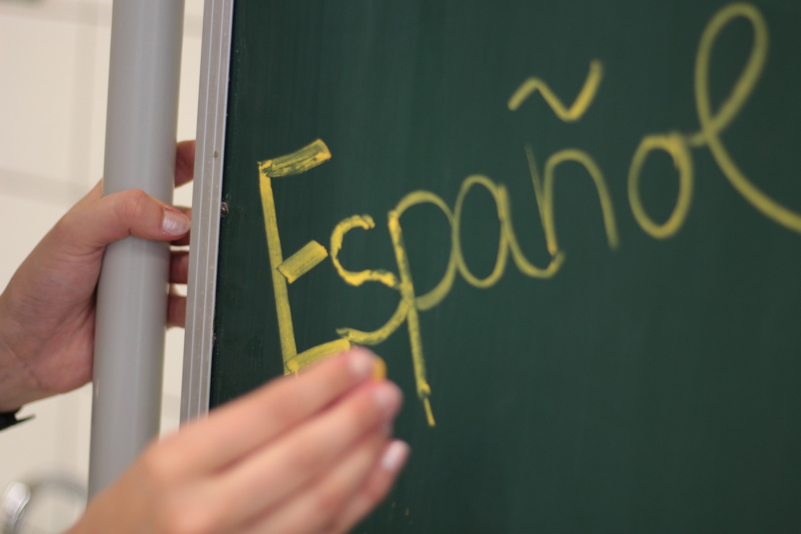 Ordet Espanol skrivet med krita.