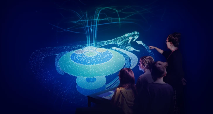 Barn på visning framför visualisering.